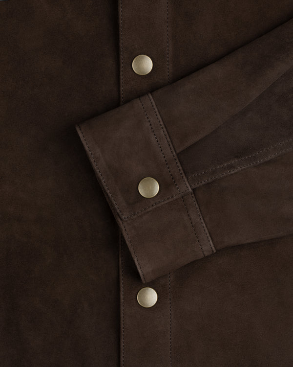 Dark brown suede Suede Overshirt cuff with a matte gold button, matching those on the placket.