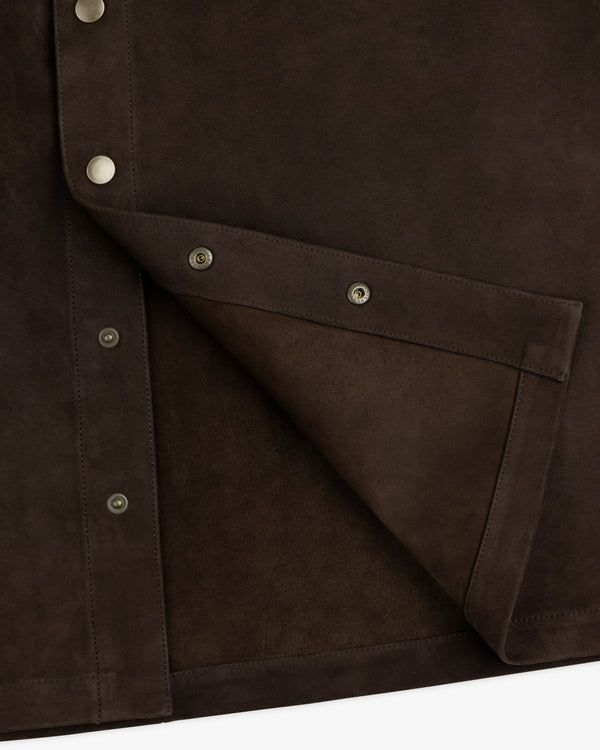 Close-up of a dark brown Suede Overshirt with silver snap buttons.