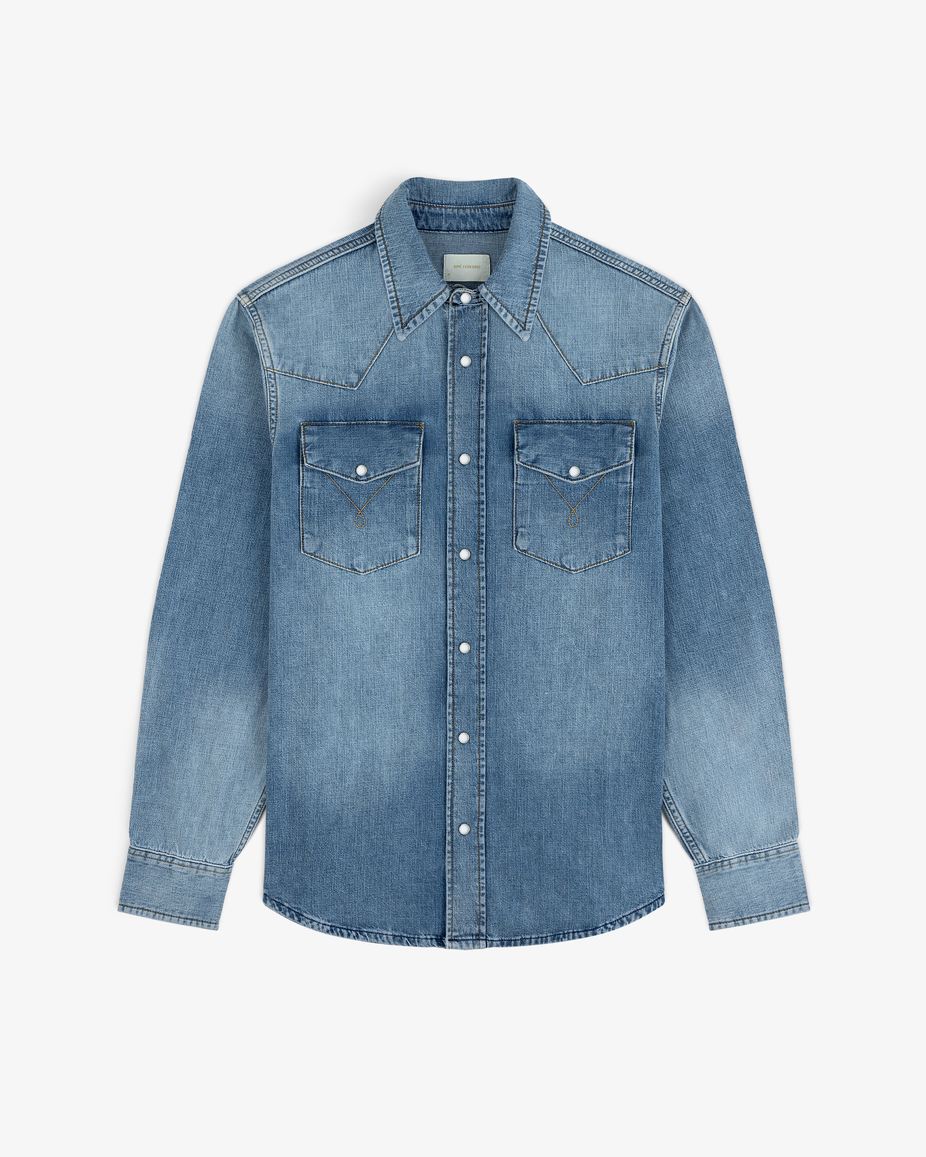 Denim Western Shirt: a long-sleeve blue denim button-down with two chest pockets and snap buttons.