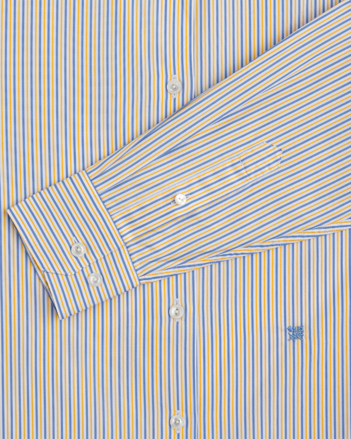 Blue and yellow vertical striped Striped Button Down Poplin Shirt with buttons and an embroidered logo on the chest.