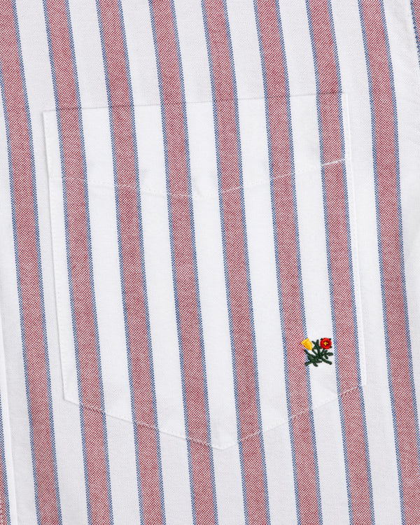 Striped Crest Oxford Shirt: White with red/blue stripes, chest pocket, and embroidered flowers at lower right.