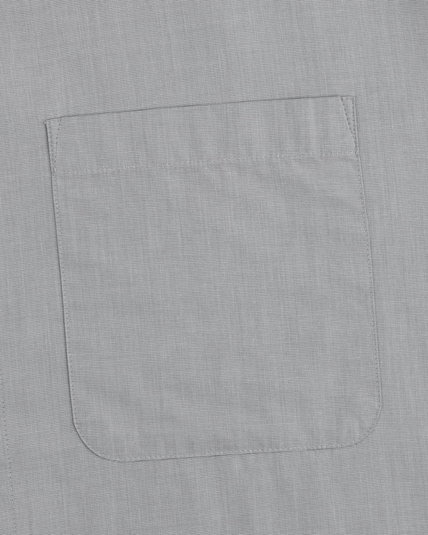 Poplin Casual Shirt in gray fabric with a square chest pocket and visible stitching at the pocket edges.