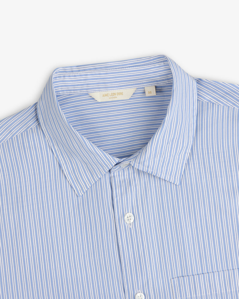 Blue and white striped Poplin Casual Shirt with collar, chest-up view, label visible inside collar.