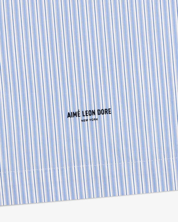 Poplin Casual Shirt in light blue and white stripes with AIMÉ LEON DORE NEW YORK logo printed in black.