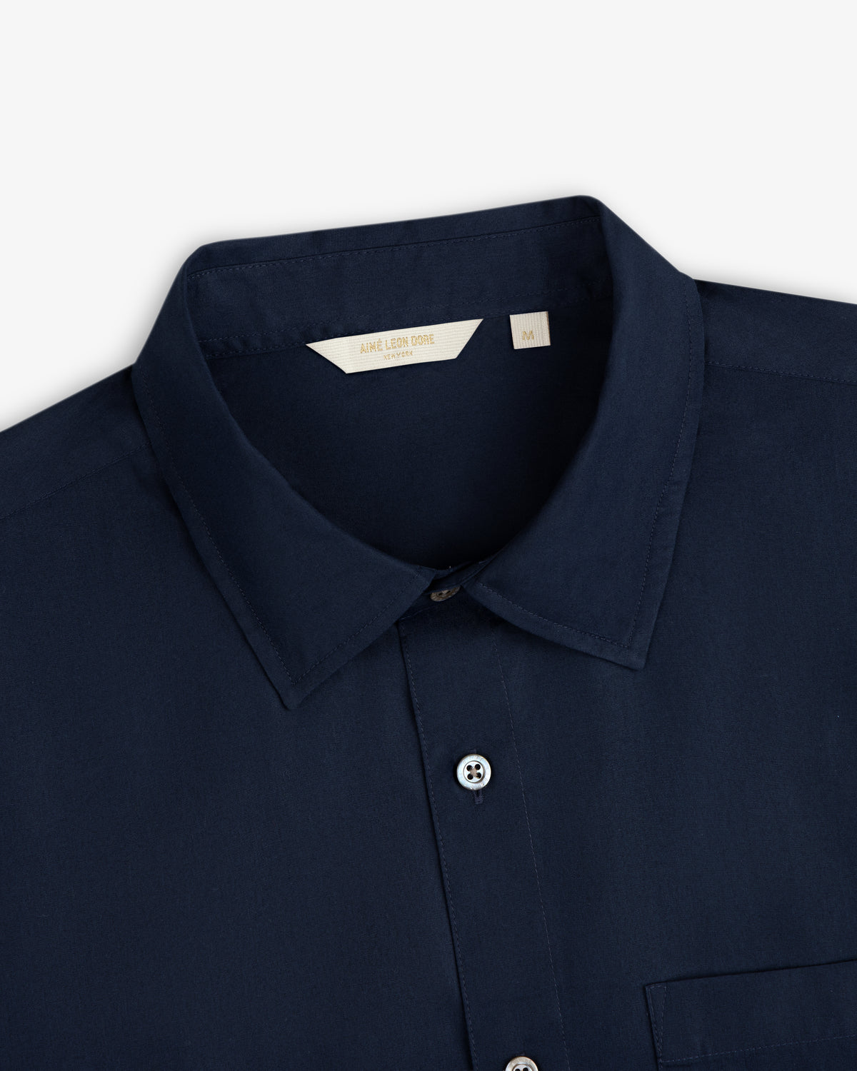 Navy blue Poplin Casual Shirt, collared button-up, size medium tag visible inside the collar.