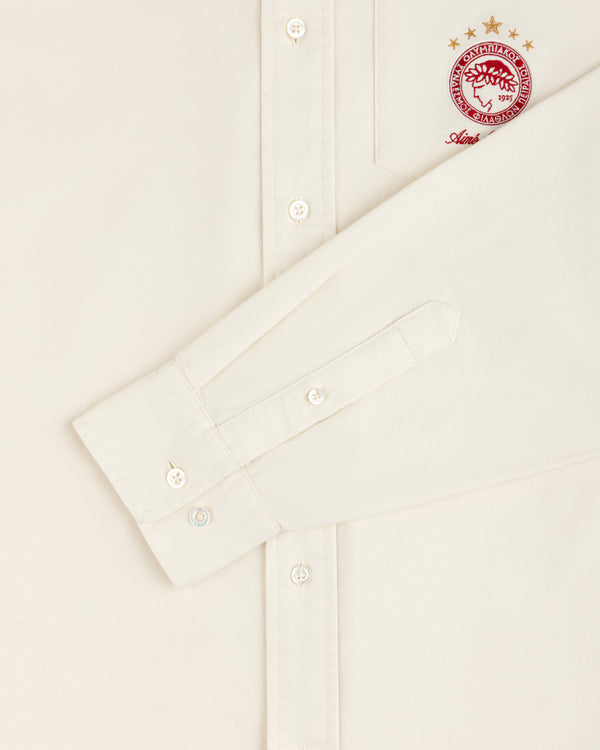 Off-white long-sleeve ALD / Olympiacos F.C. Logo Oxford Shirt with an embroidered club crest on the chest pocket.