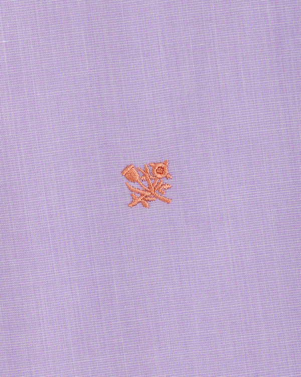 Button Down Poplin Shirt in light purple fabric with a small orange embroidered floral emblem.