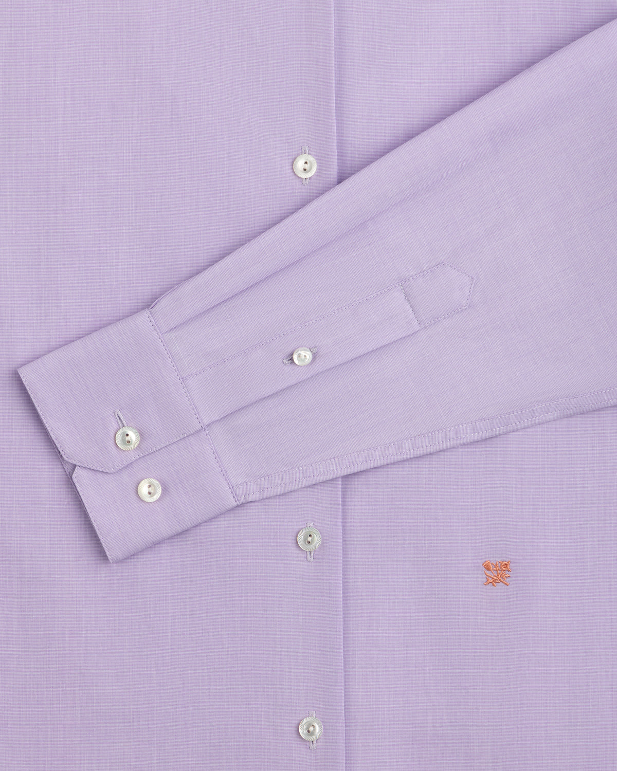 Light purple Button Down Poplin Shirt with long sleeves, white buttons, and a small embroidered emblem on the chest.
