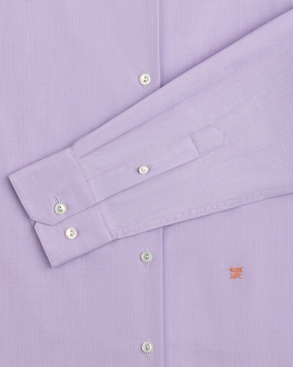Light purple Button Down Poplin Shirt with long sleeves, white buttons, and a small embroidered emblem on the chest.