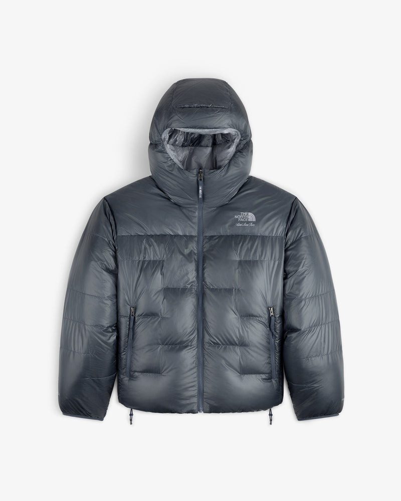 ALD/The North Face Reversible Pertex® Nuptse Jacket in gray with hood, zipper, and chest logo, on white backdrop.