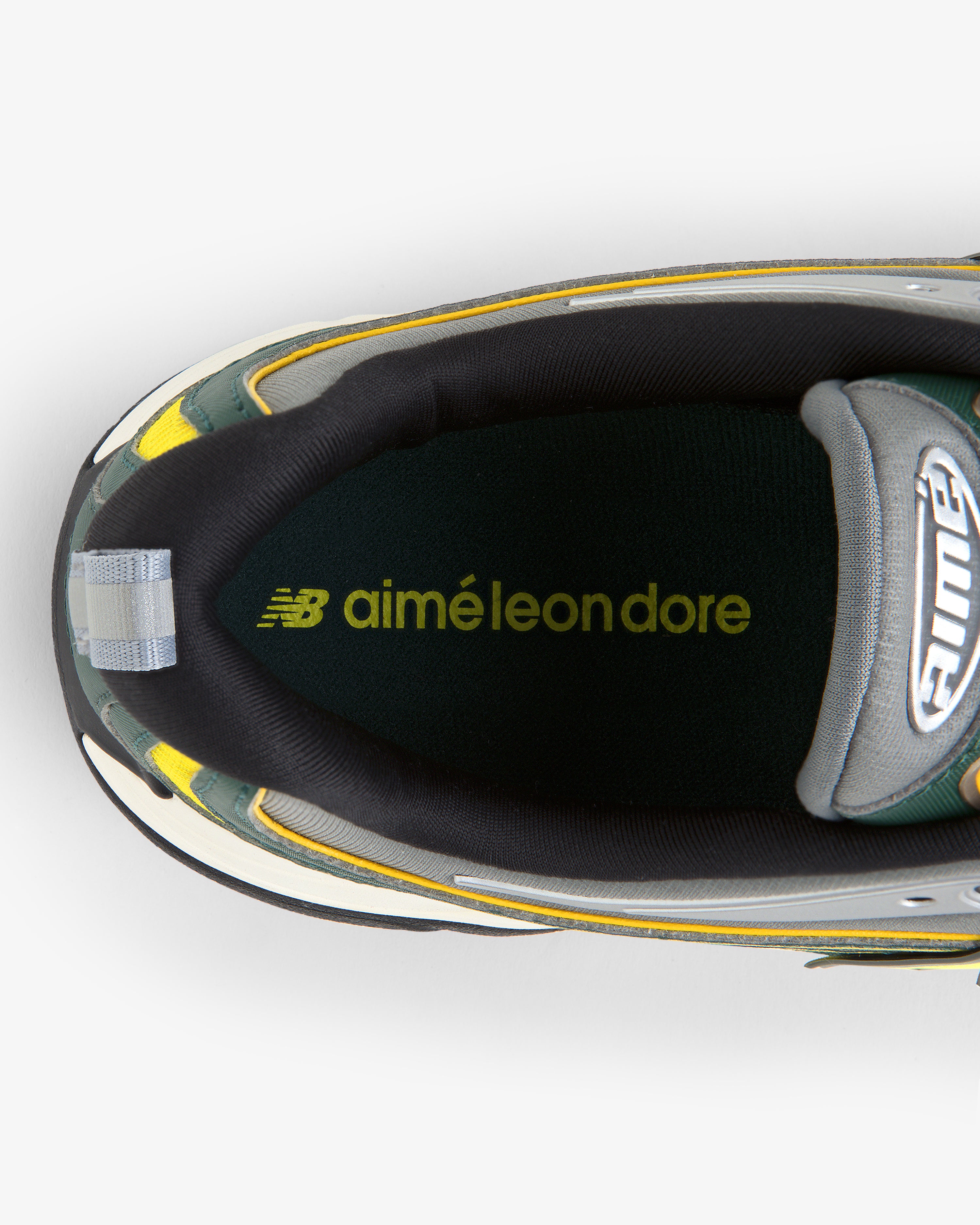 Top view of the ALD / New Balance RC56 sneaker with logos printed inside on the insole.