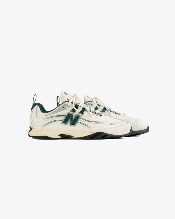 ALD / New Balance RC56 white and green sneakers with a large N logo, shown from the side on a white background.