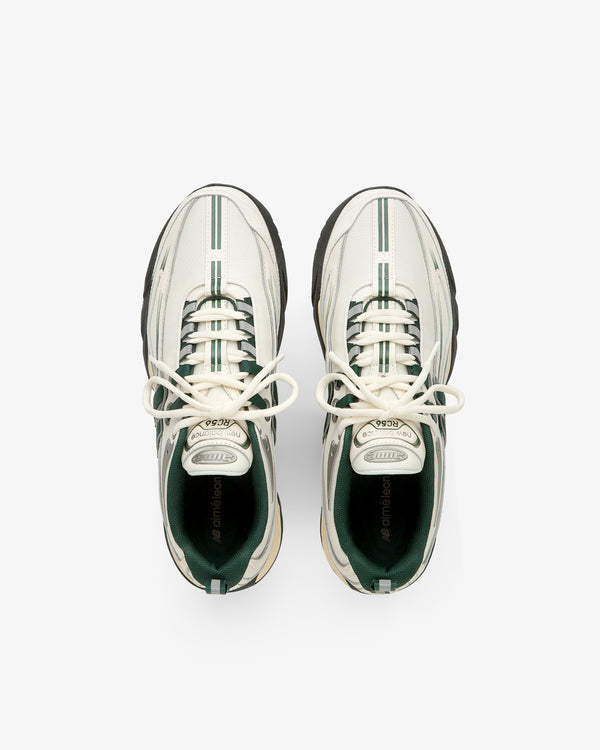 ALD / New Balance RC56 white sneakers with green stripes and black soles, viewed from above on a white background.