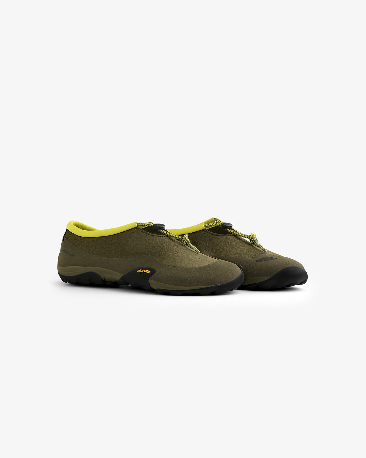 ALD / New Balance MT10T Sport Shoe in olive green with black soles and yellow trim, angled on a white background.
