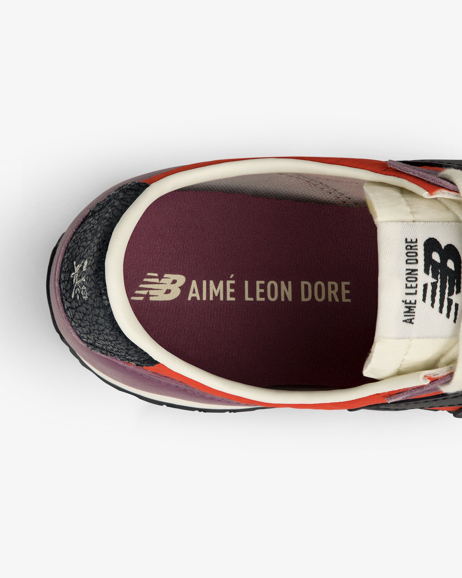 Top view of the ALD / New Balance 471 sneaker with AIMÉ LEON DORE branding on the insole and tongue.