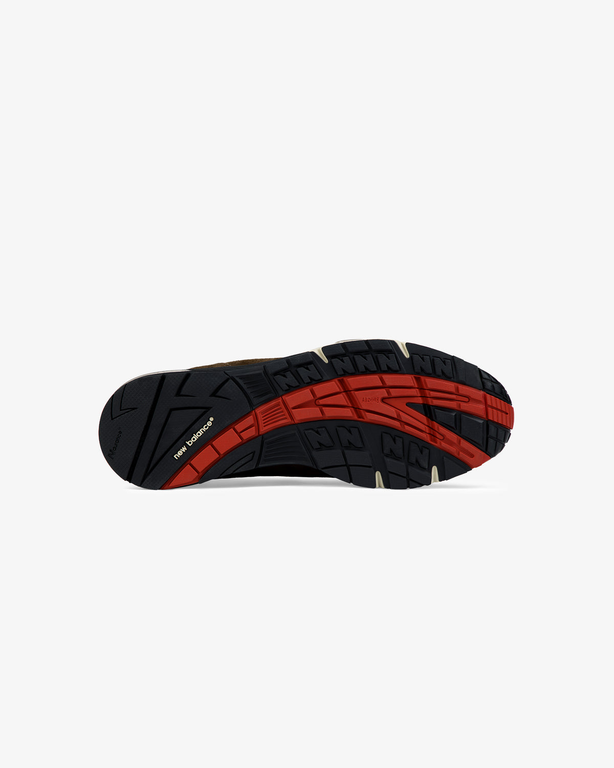 Black sole with red and tan accents, textured tread, and ALD / New Balance Made in UK 991 branding underneath.