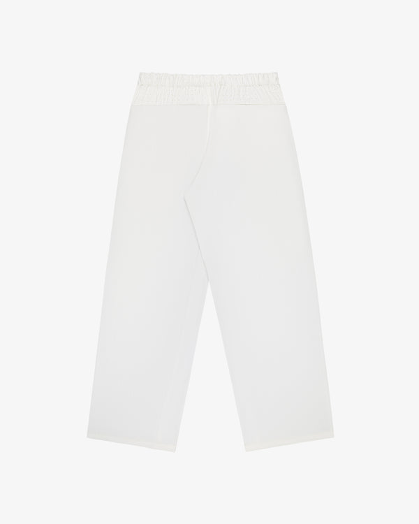 ALD / New Balance RC56 Performance Nylon Trouser with elastic waistband, wide-leg style, laid flat on white background.