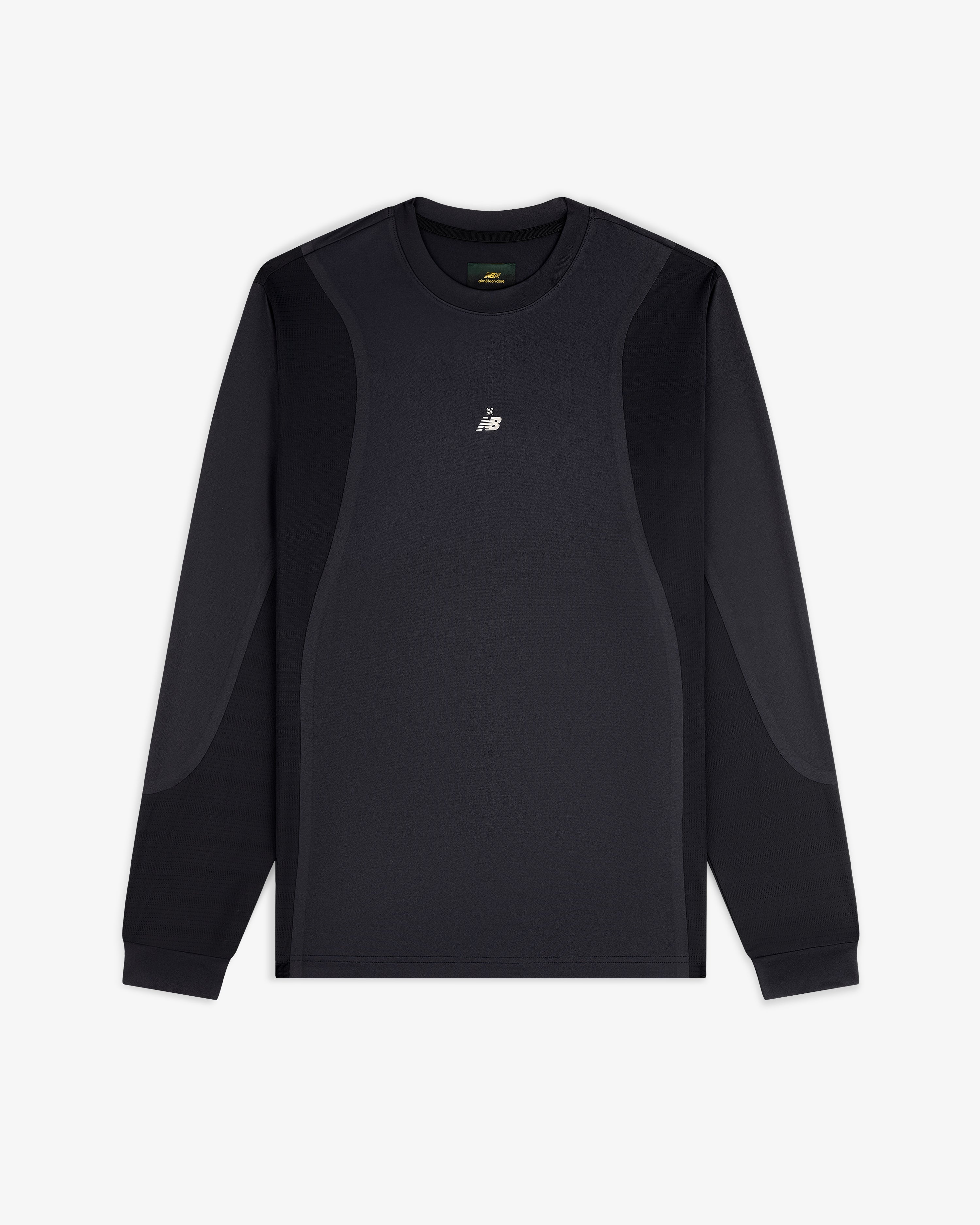 ALD / New Balance Performance Long-Sleeve Tee in black with subtle panels and white chest logo, shown on white background.