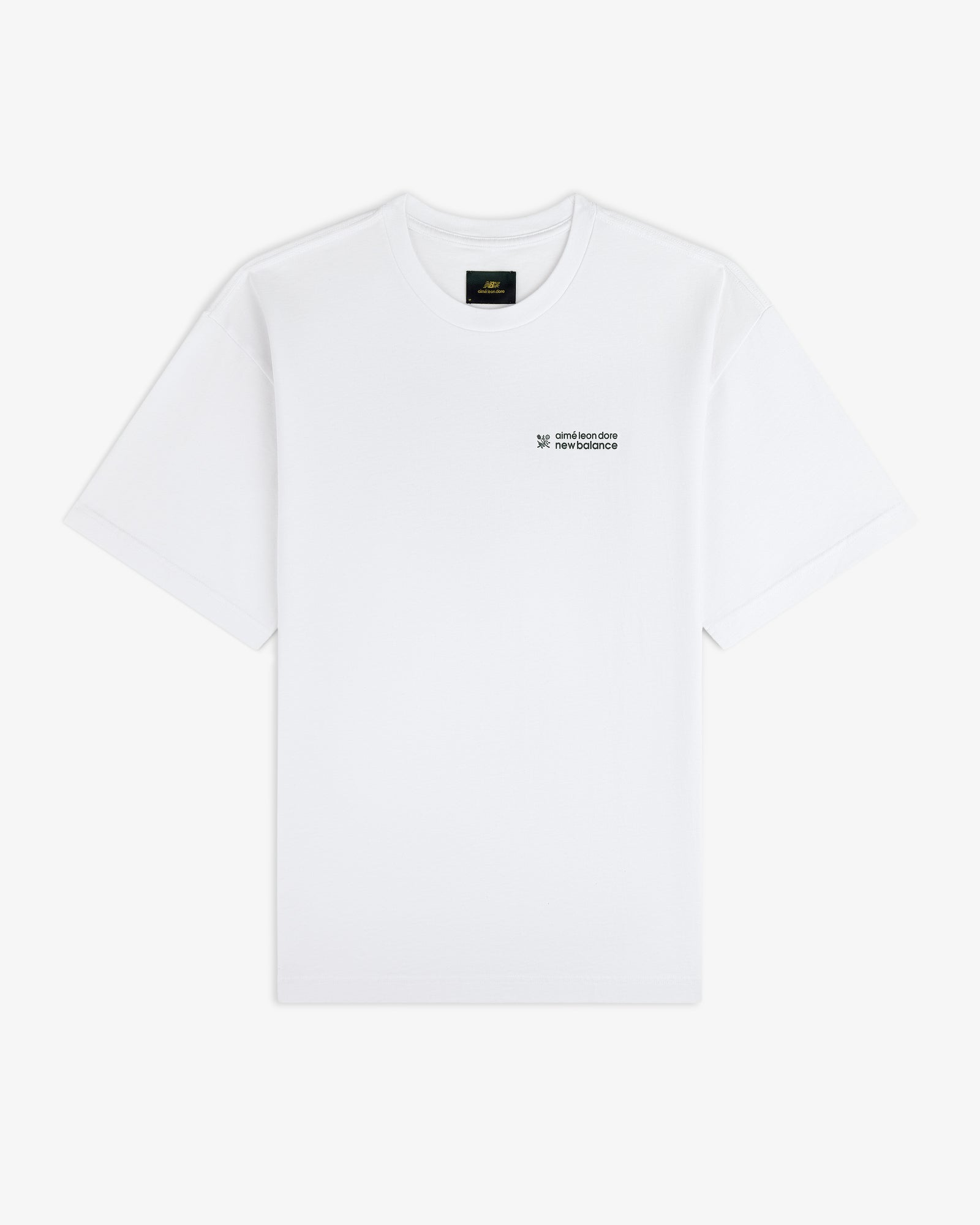 ALD / New Balance Running Bib Tee, plain white with small black logo and text on left chest, shown on white background.