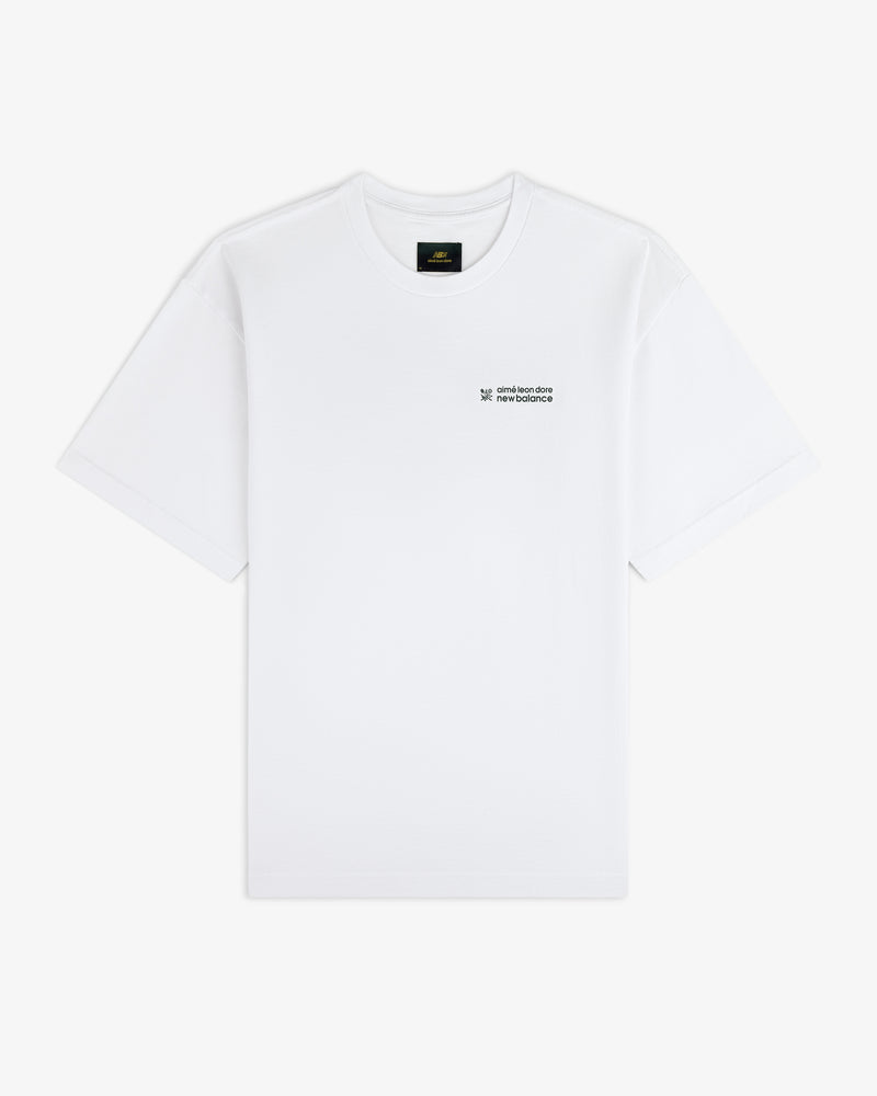ALD / New Balance Running Bib Tee, plain white with small black logo and text on left chest, shown on white background.