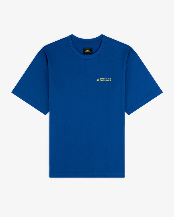 ALD / New Balance Running Bib Tee in blue with small yellow-green chest text, displayed flat on a white background.
