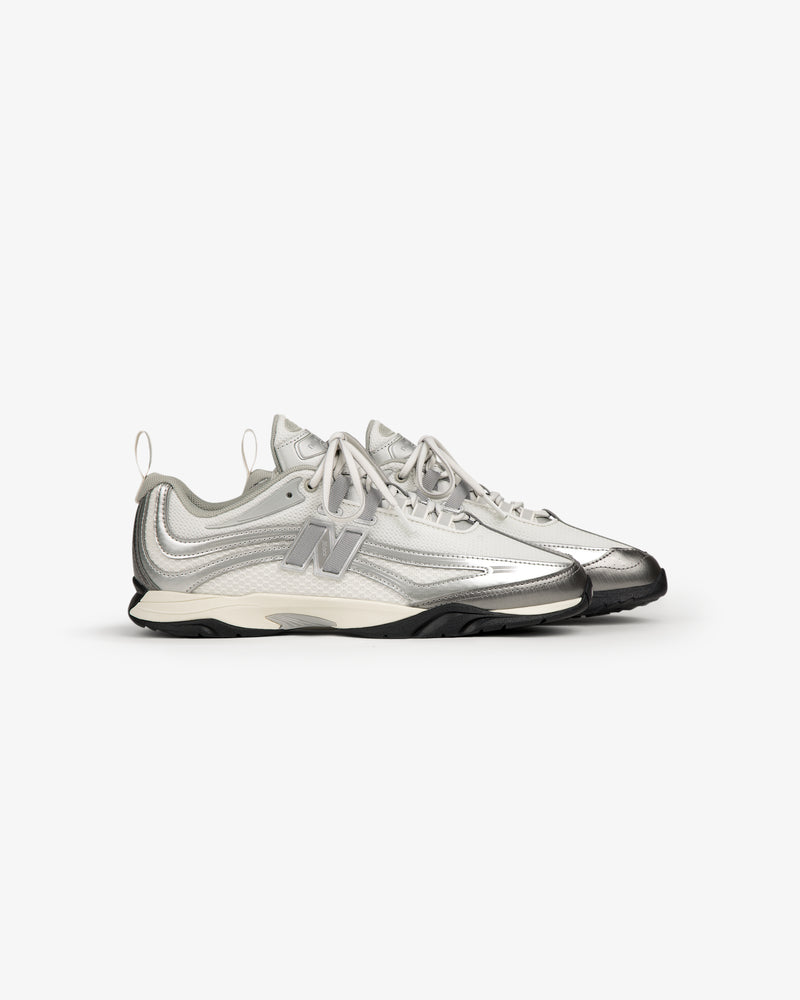 ALD / New Balance RC56, silver/white, FuelCell midsole, US men's sizes, black soles, side view.