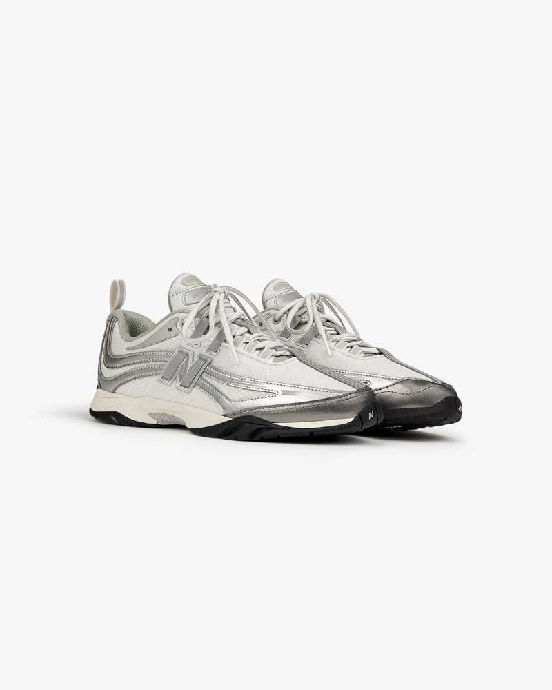 ALD / New Balance RC56 gray and white sneakers with black soles and a FuelCell midsole.