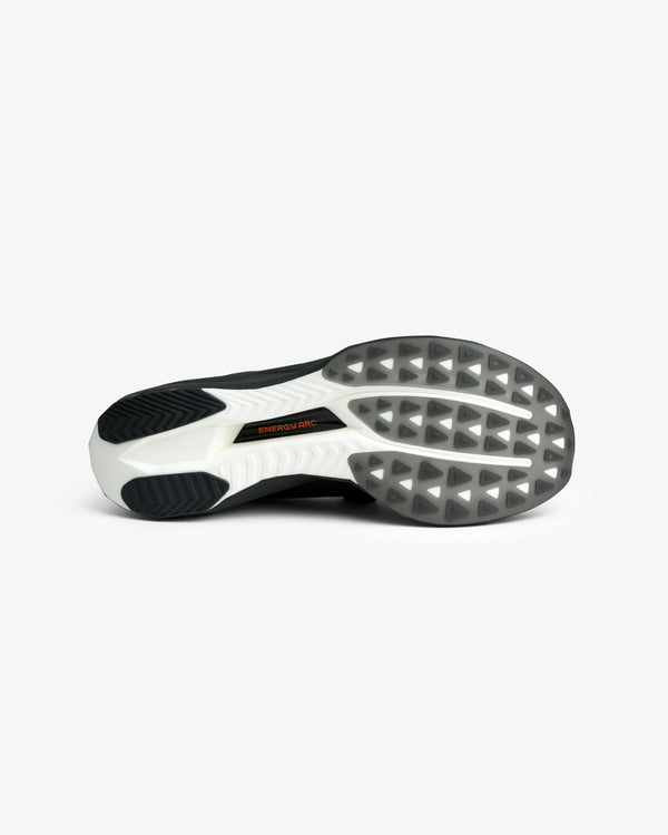Bottom view of ALD / New Balance FuelCell SuperComp Elite v5 with black and white sole, triangle pattern, and Energy Arc text.