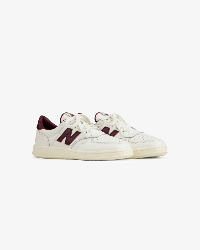 Off-white ALD / New Balance T500 Tennis Oxfords with a burgundy N logo and heel tab.