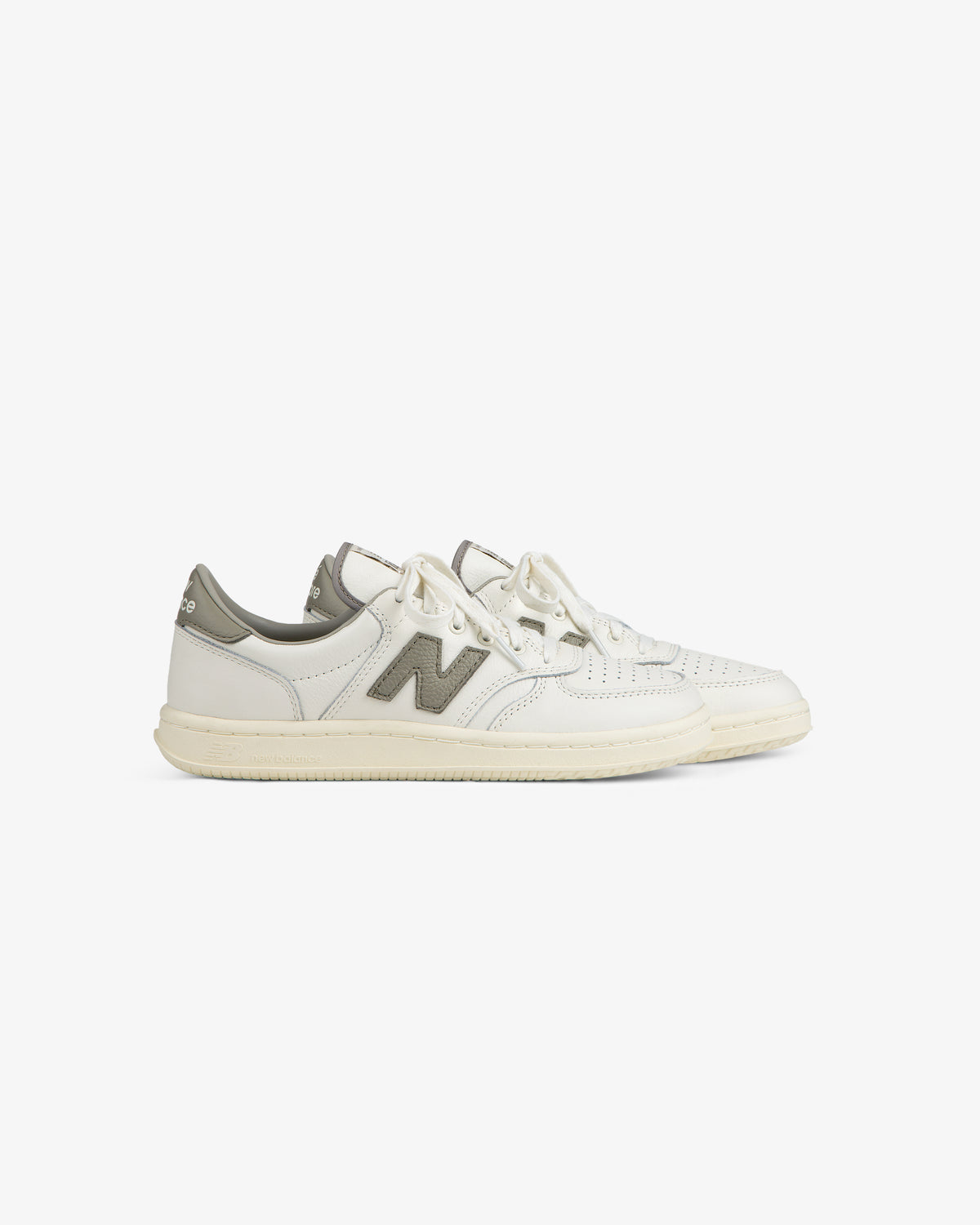 White leather ALD / New Balance T500 Tennis Oxfords with a grey logo and heel tab.