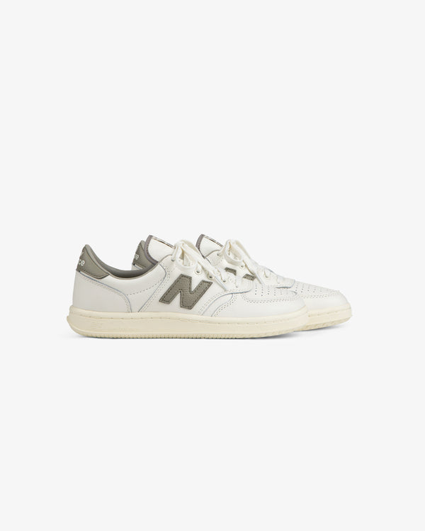 White leather ALD / New Balance T500 Tennis Oxfords with a grey logo and heel tab.