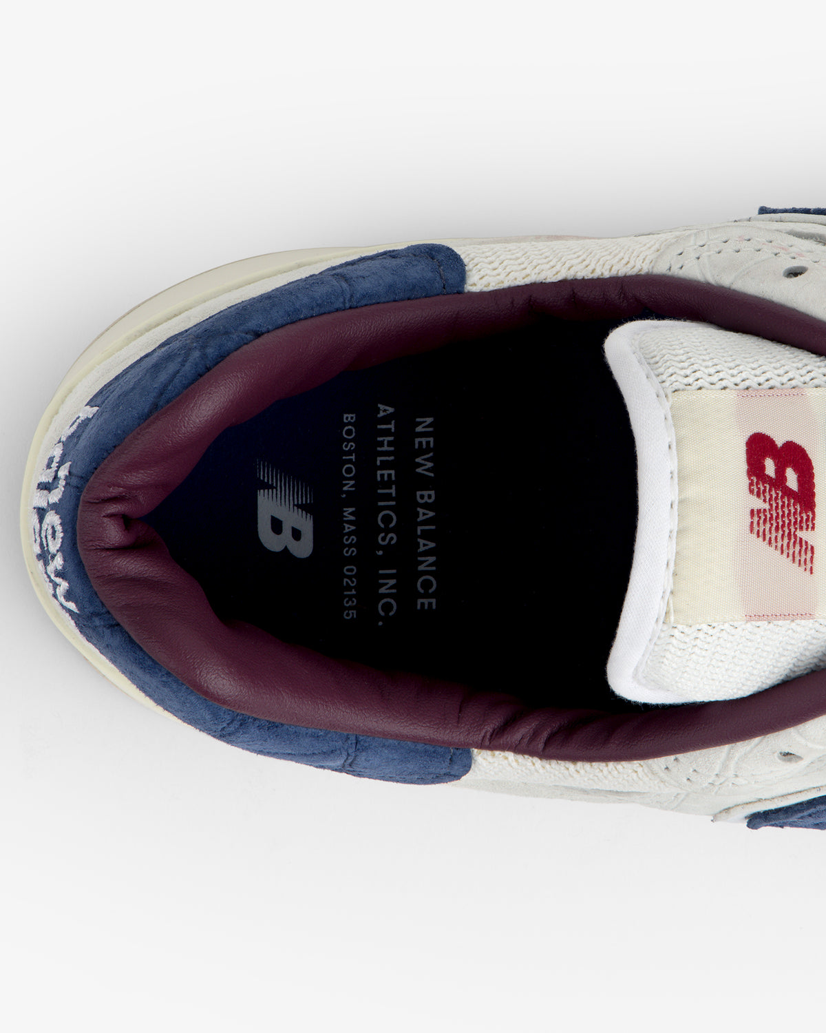 Top view of New Balance Made in USA 1300, showing branded insole and partial logo on the tongue.