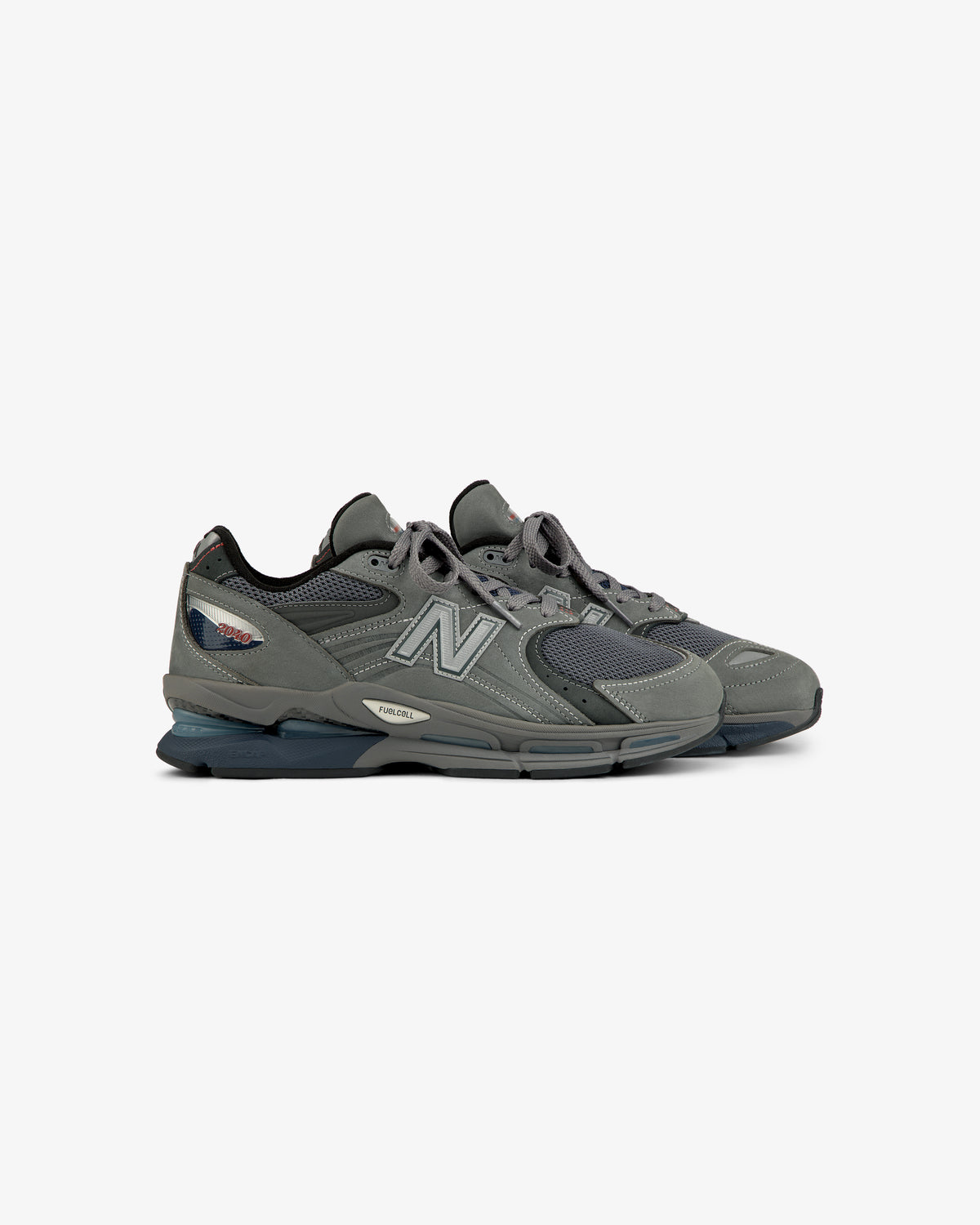 New Balance Made in USA 2040v5: gray mesh/suede sneakers with silver N logo, blue accents, and white sole.