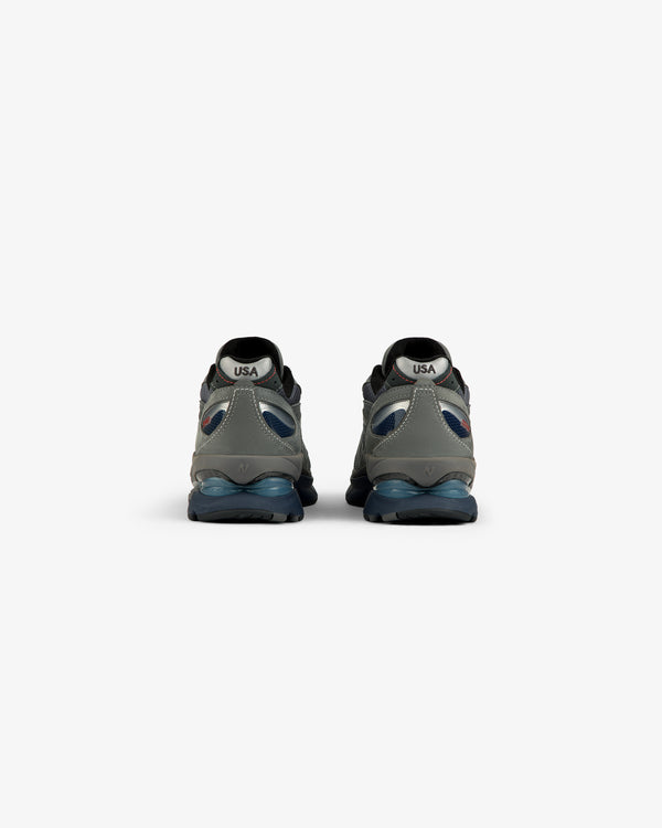 New Balance Made in USA 2040v5 sneakers, gray/blue, rear view with “USA” on white heel patches.