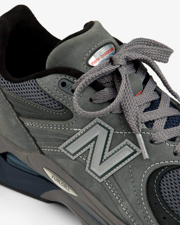 Close-up of the gray New Balance Made in USA 2040v5 sneaker with gray laces and mesh detailing.