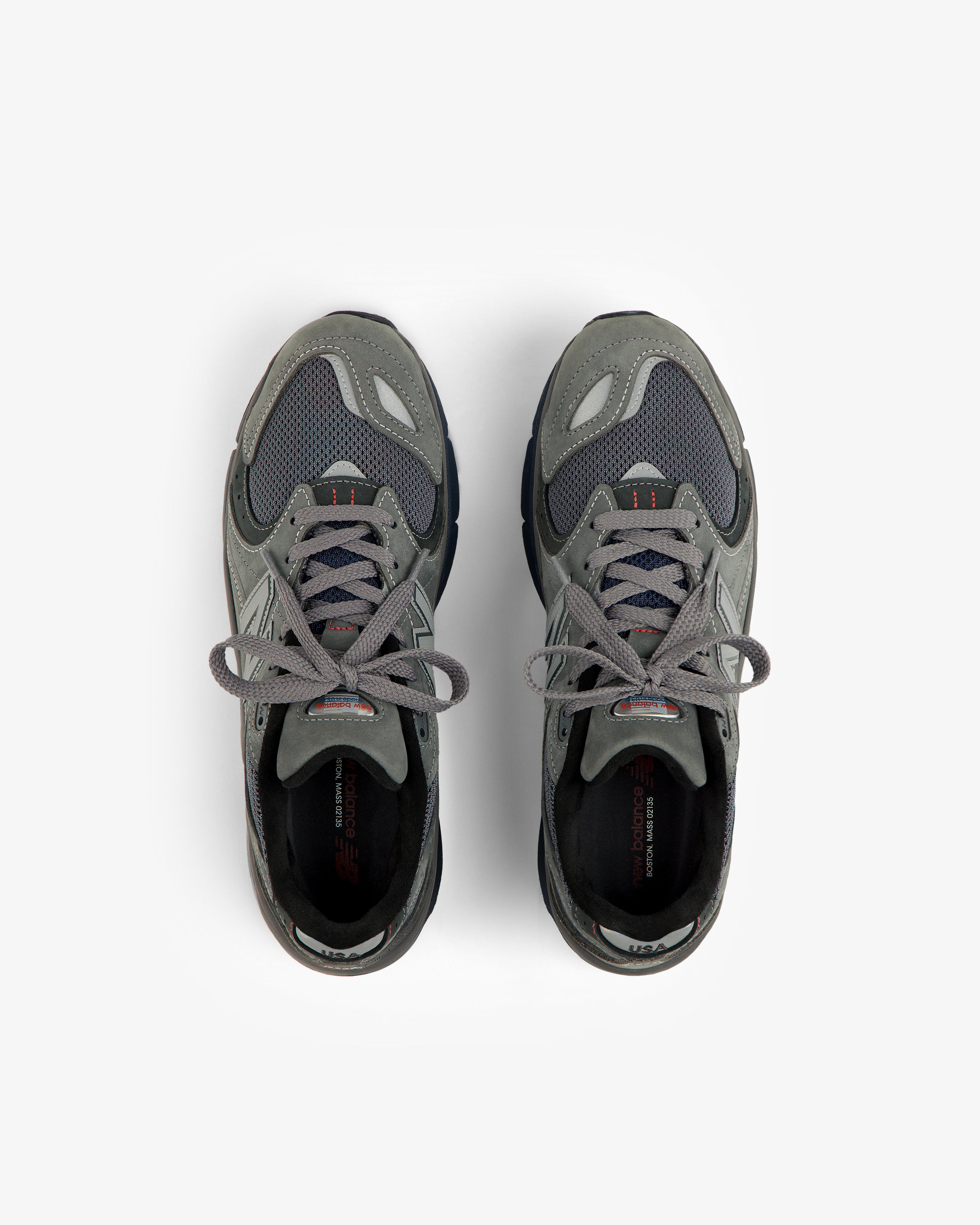 A pair of gray New Balance Made in USA 2040v5 sneakers shown from above on a white background.