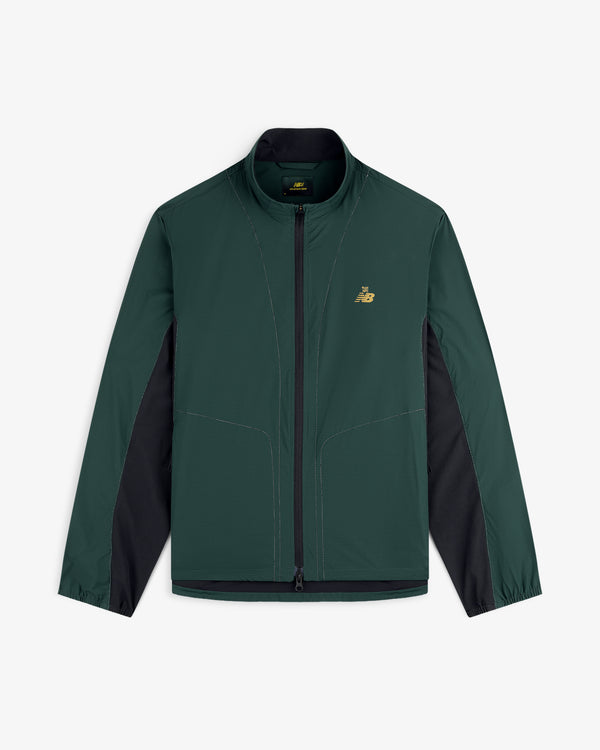 Dark green and black ALD / New Balance Performance Nylon Jacket with long sleeves and a gold chest logo.