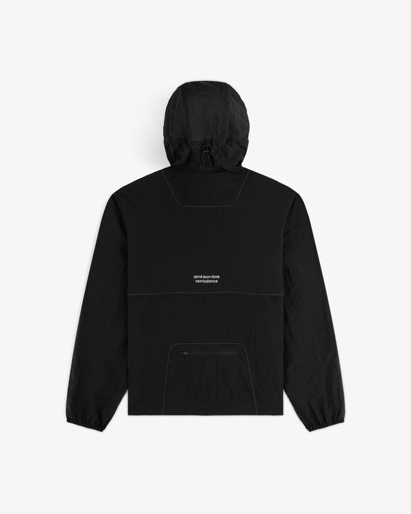 The ALD / New Balance Breathable Half-Zip Pullover is black with a front pocket and small white text on the back.