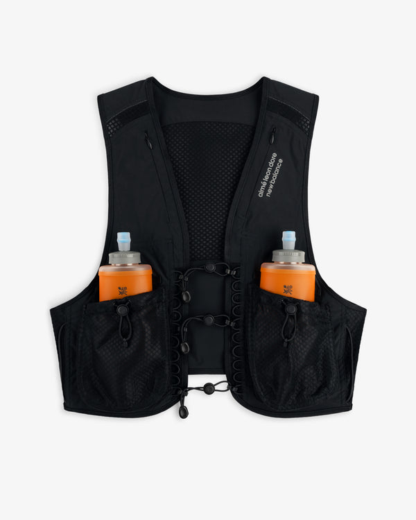 ALD / New Balance Hydrovest in black features two front pockets, each with an orange water bottle and blue cap.