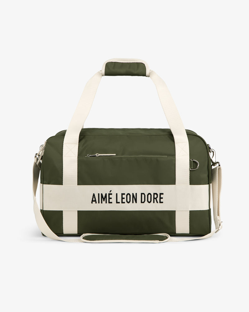 Olive green Nylon Duffle Bag with cream handles and strap, featuring AIMÉ LEON DORE text on the front.