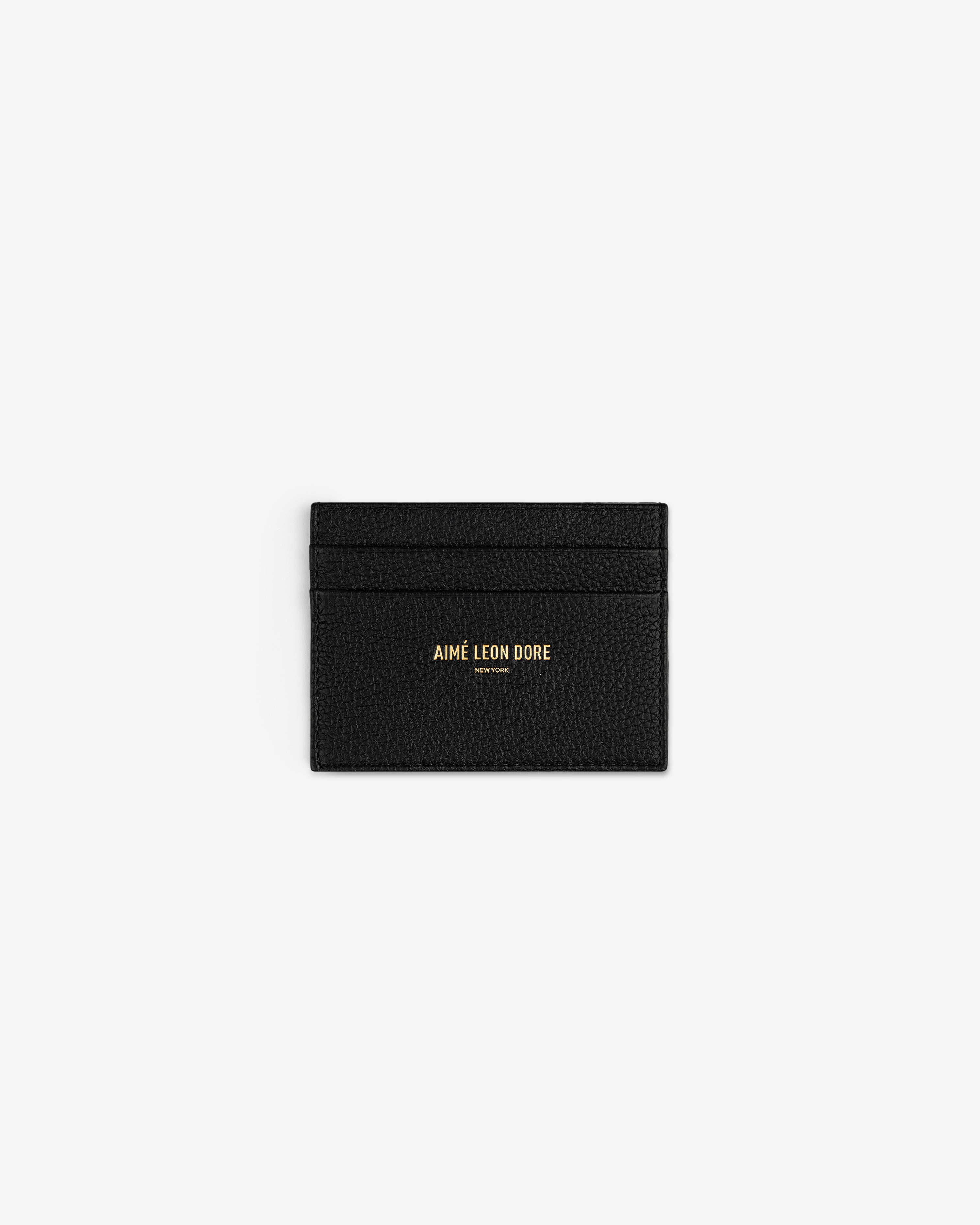 Leather Card Holder in black with two card slots and gold AIMÉ LEON DORE logo on the front.