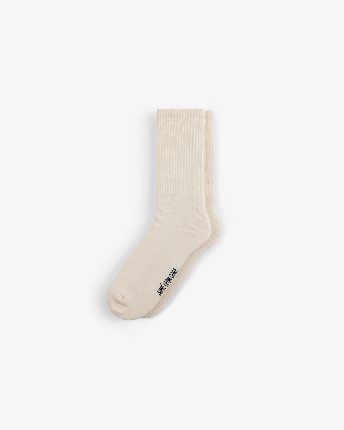 Crew Sock 3-Pack: cream crew socks with ribbed cuffs and small black text near the toe on a white background.