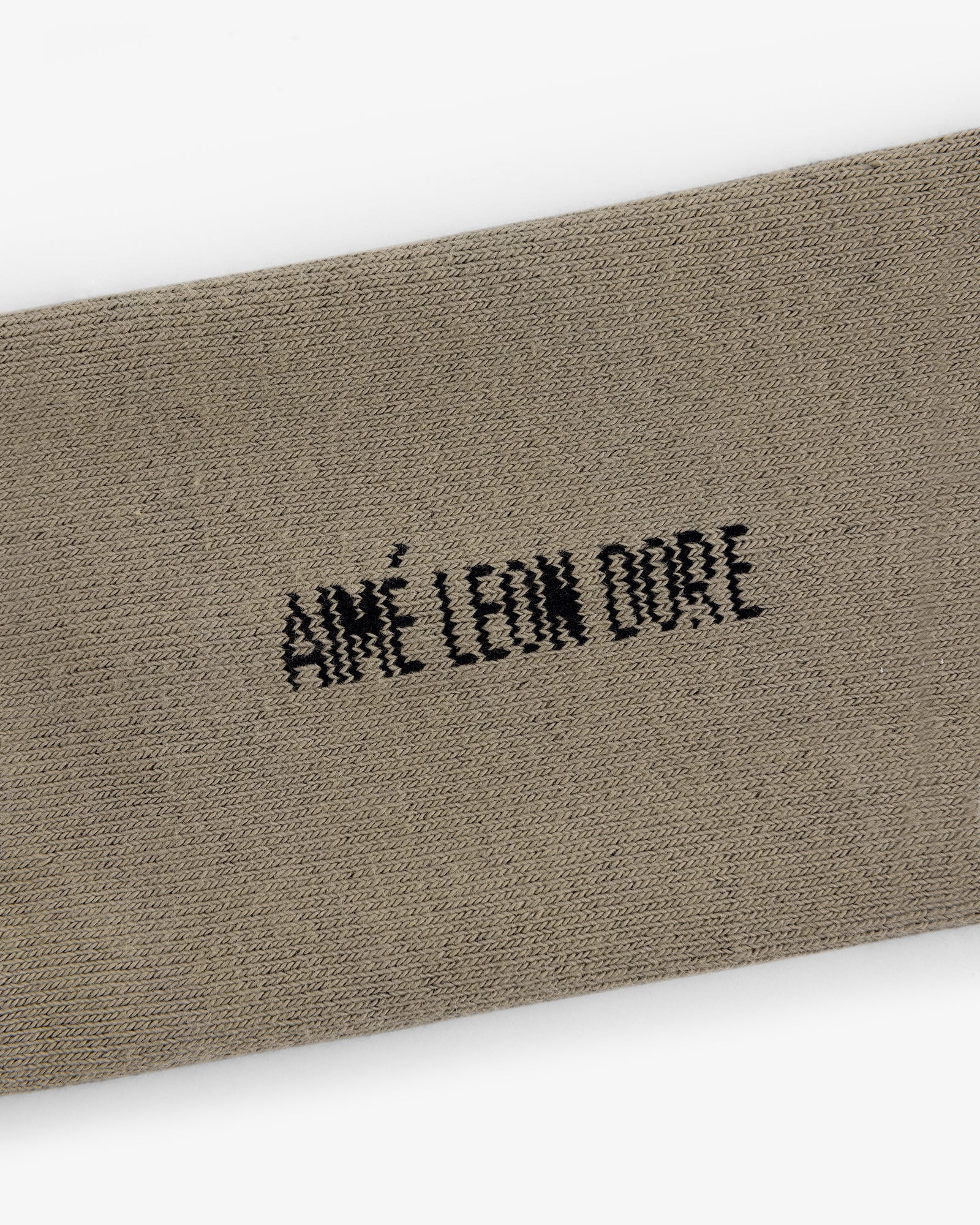 Beige Crew Sock 3-Pack with AIMÉ LEON DORE embroidered in black thread at the center.