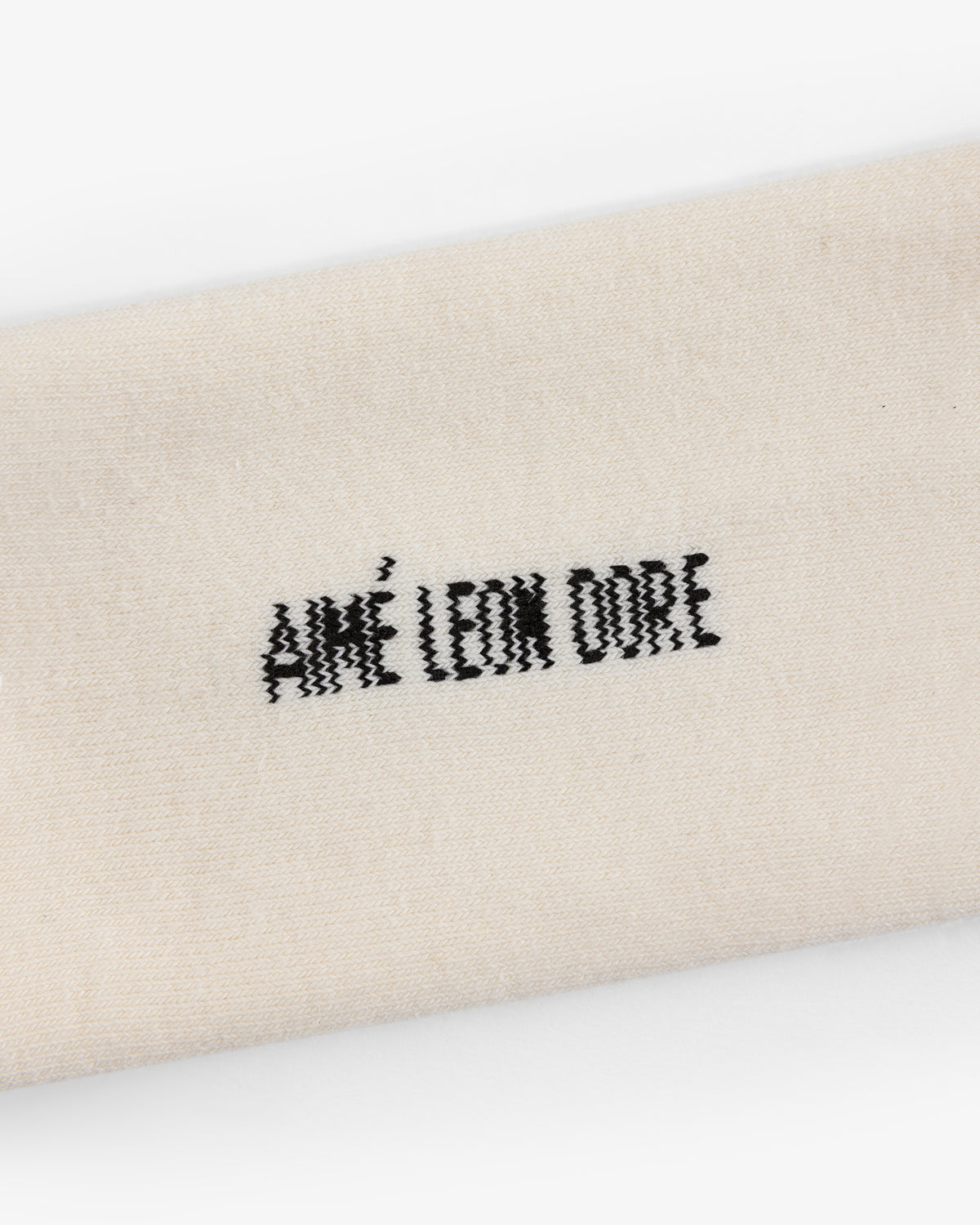 Beige Crew Sock 3-Pack with "AIMÉ LEON DORE" embroidered in black at the center.