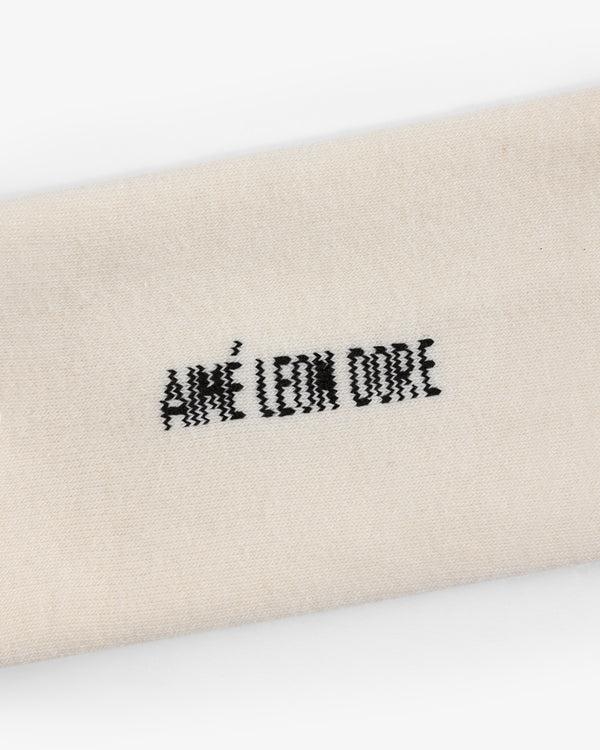 Beige Crew Sock 3-Pack with "AIMÉ LEON DORE" embroidered in black at the center.