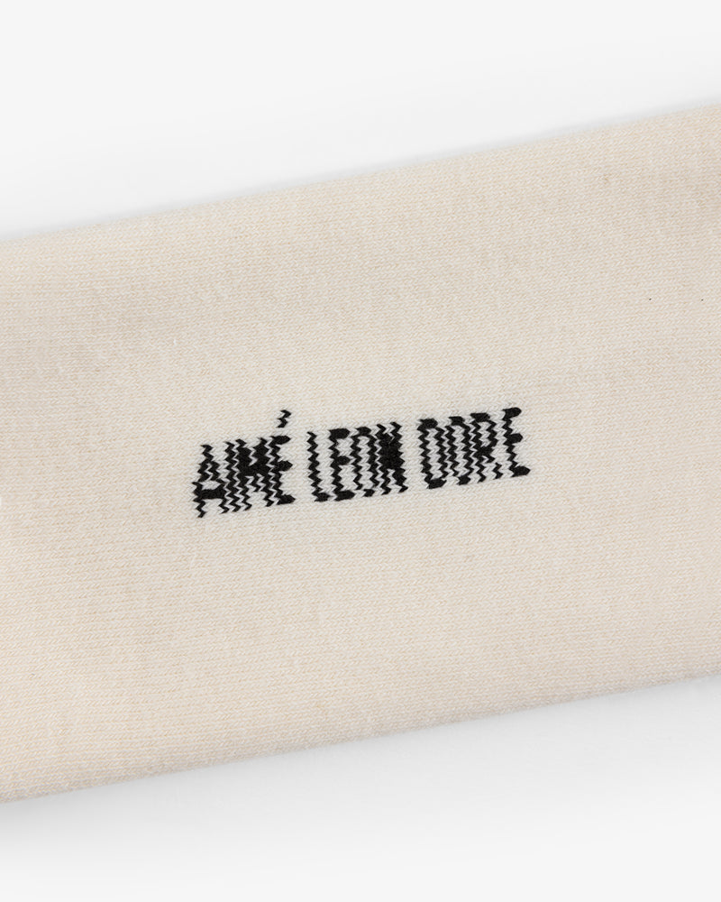 Beige Crew Sock 3-Pack with "AIMÉ LEON DORE" embroidered in black at the center.