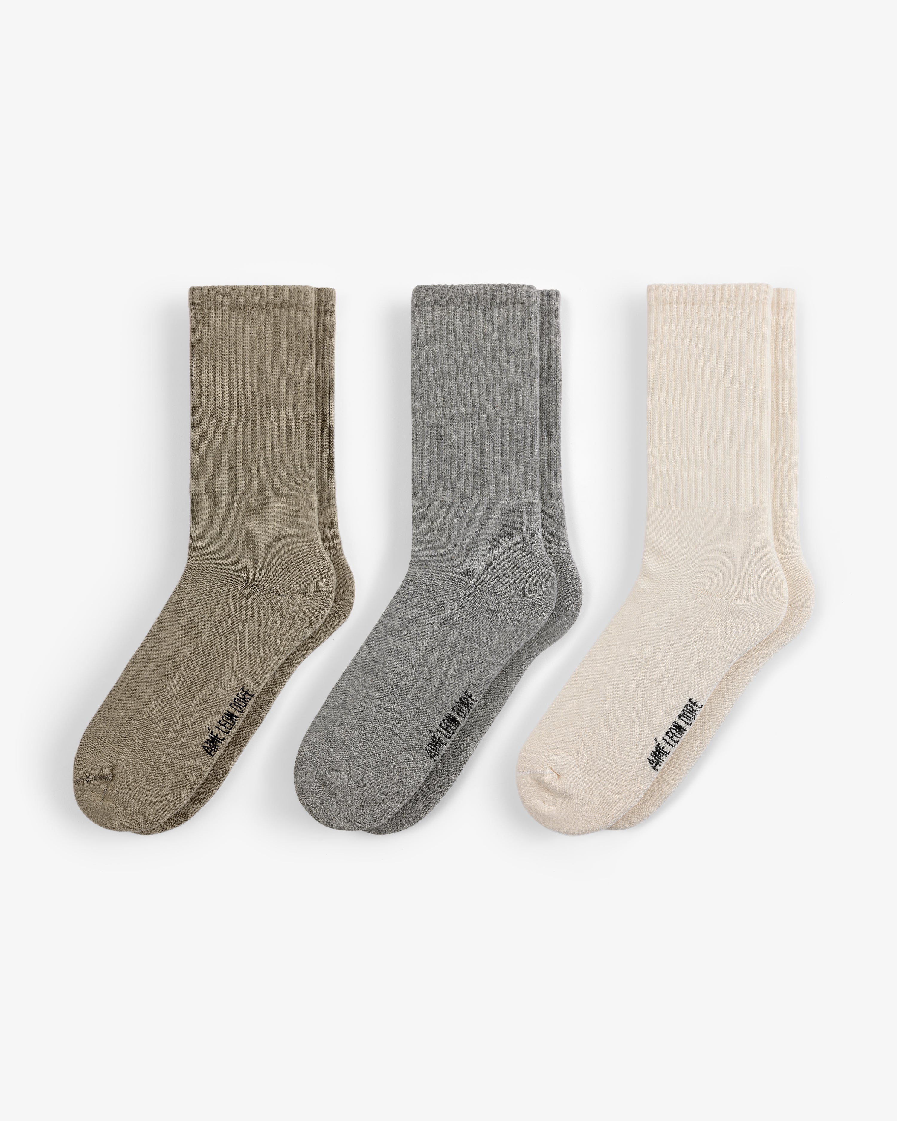 Crew Sock 3-Pack: ribbed crew socks in olive, gray, and cream, each with text detail near the toe.