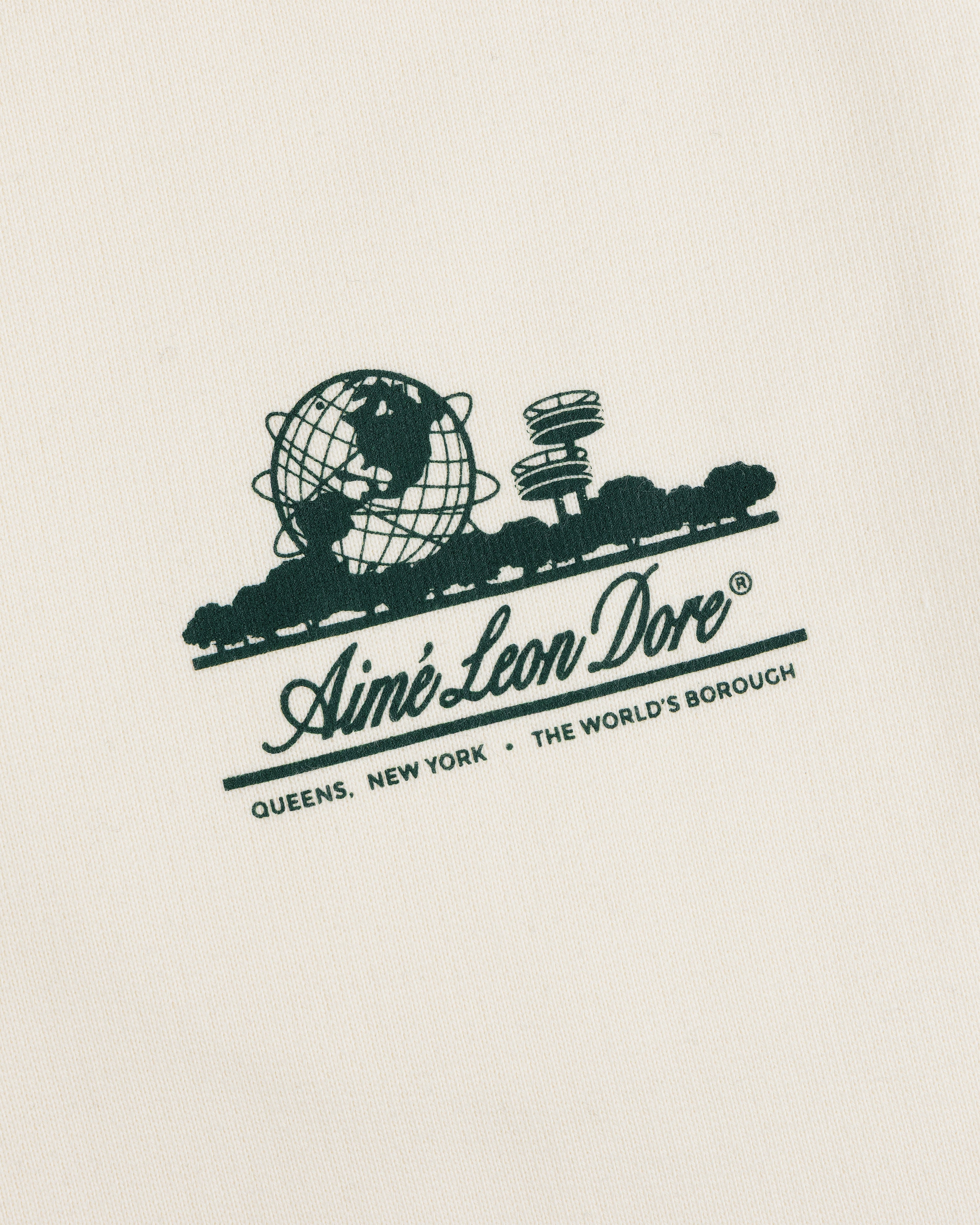Green Unisphere Sweatpants: Aimé Leon Dore logo, globe & Queens icons on cream fabric.