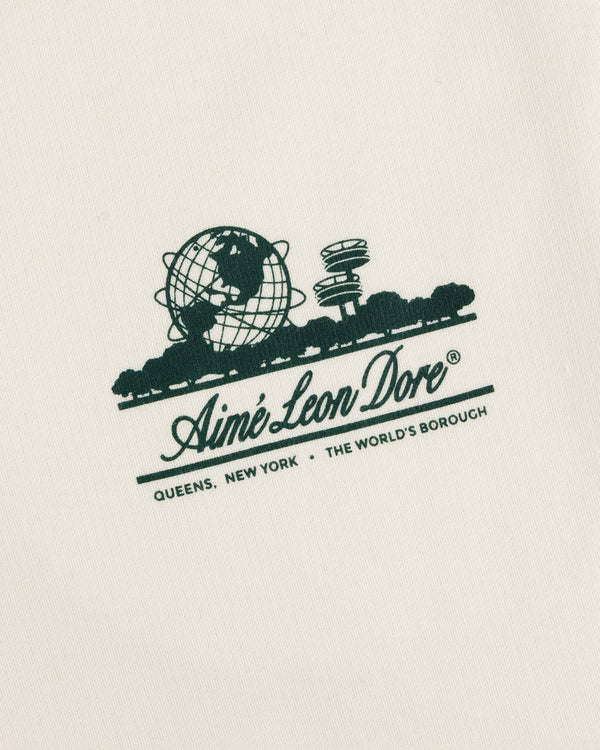 Green Unisphere Sweatpants: Aimé Leon Dore logo, globe & Queens icons on cream fabric.