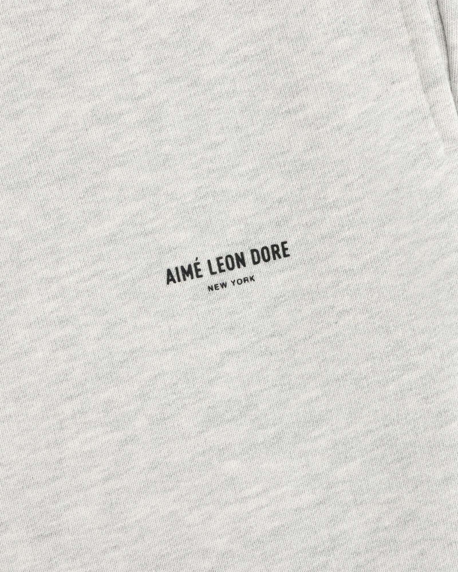 Light gray Micro Logo Sweatpants with small black AIMÉ LEON DORE NEW YORK text at the center.